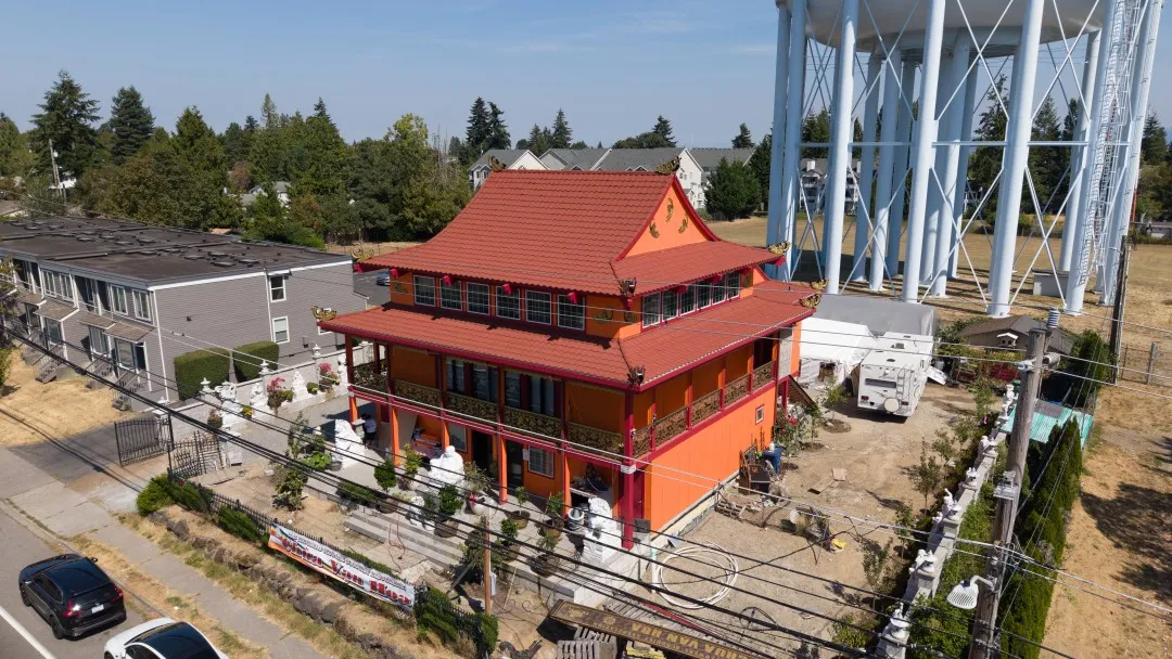 Buddhist temple surrounded by green landscape